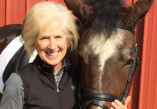 mary hugging horse